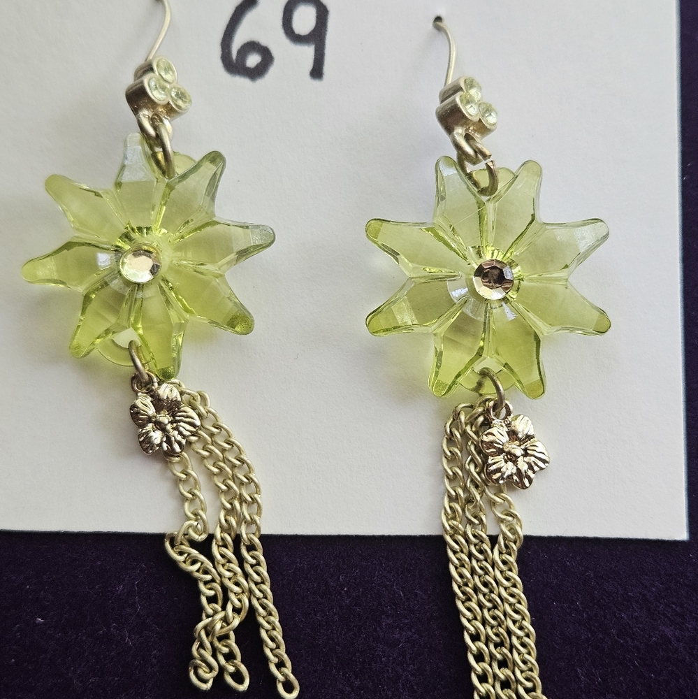 Brass tone Dangle earrings with clear green gems